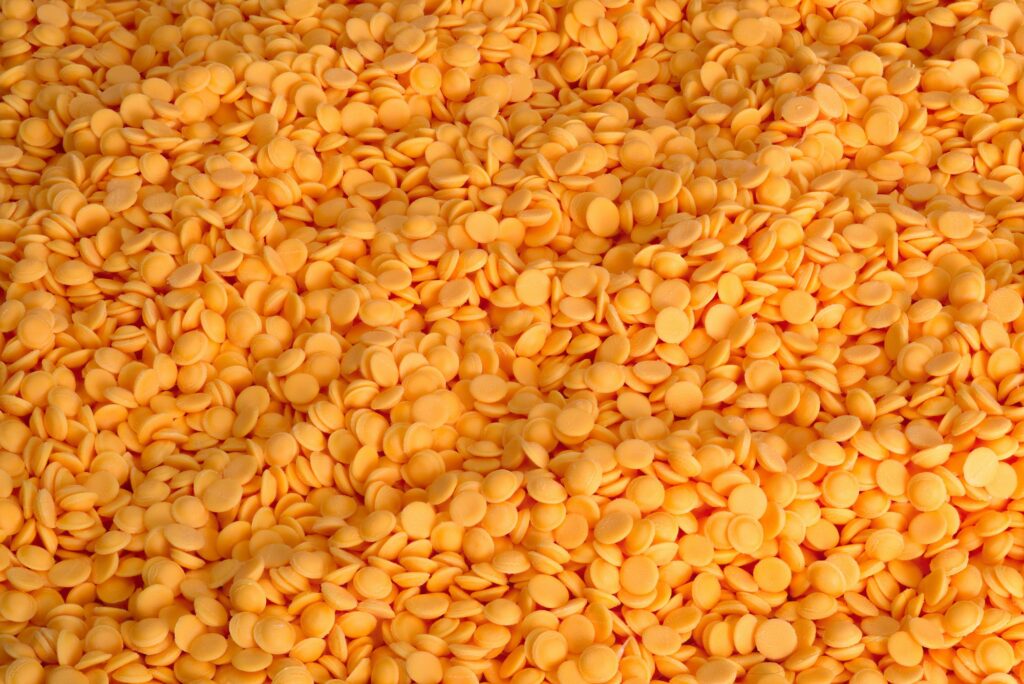 a large pile of orange round objects