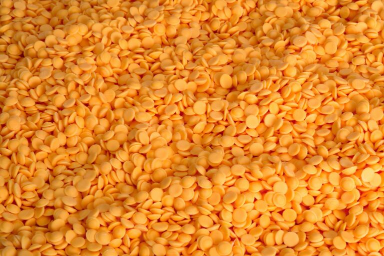 a large pile of orange round objects